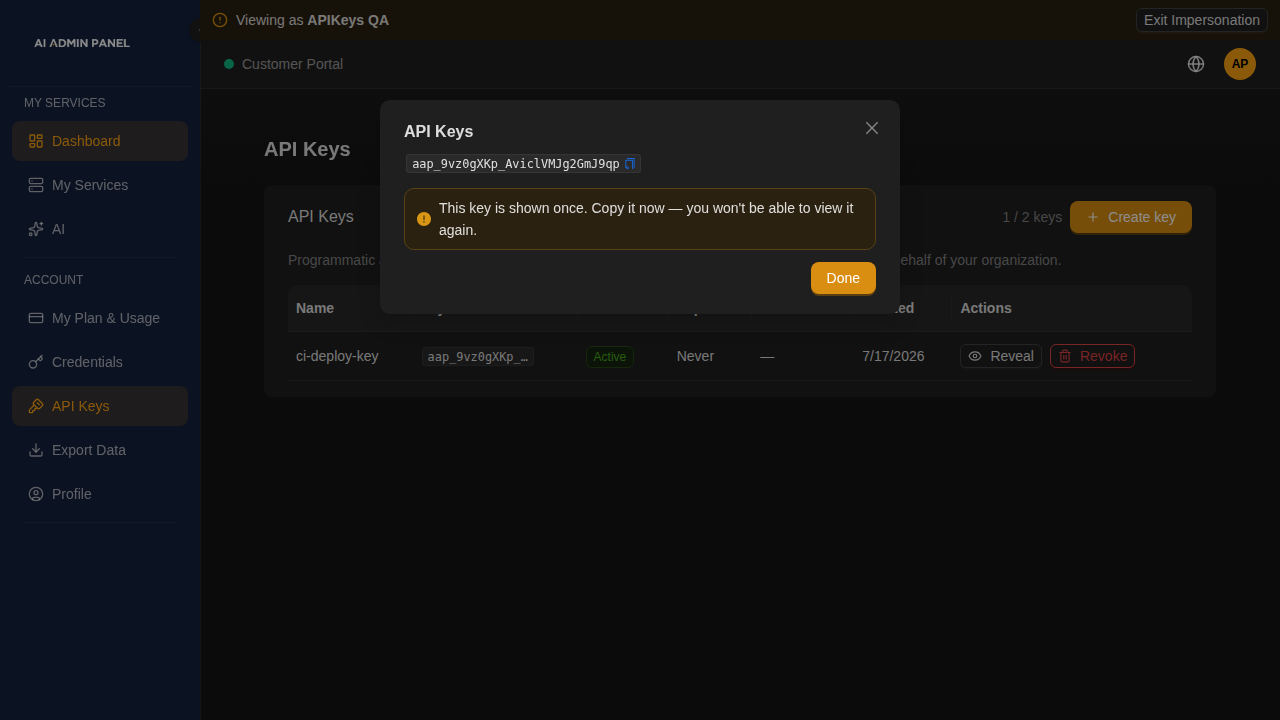The show-once dialog with the full key and a copy button
